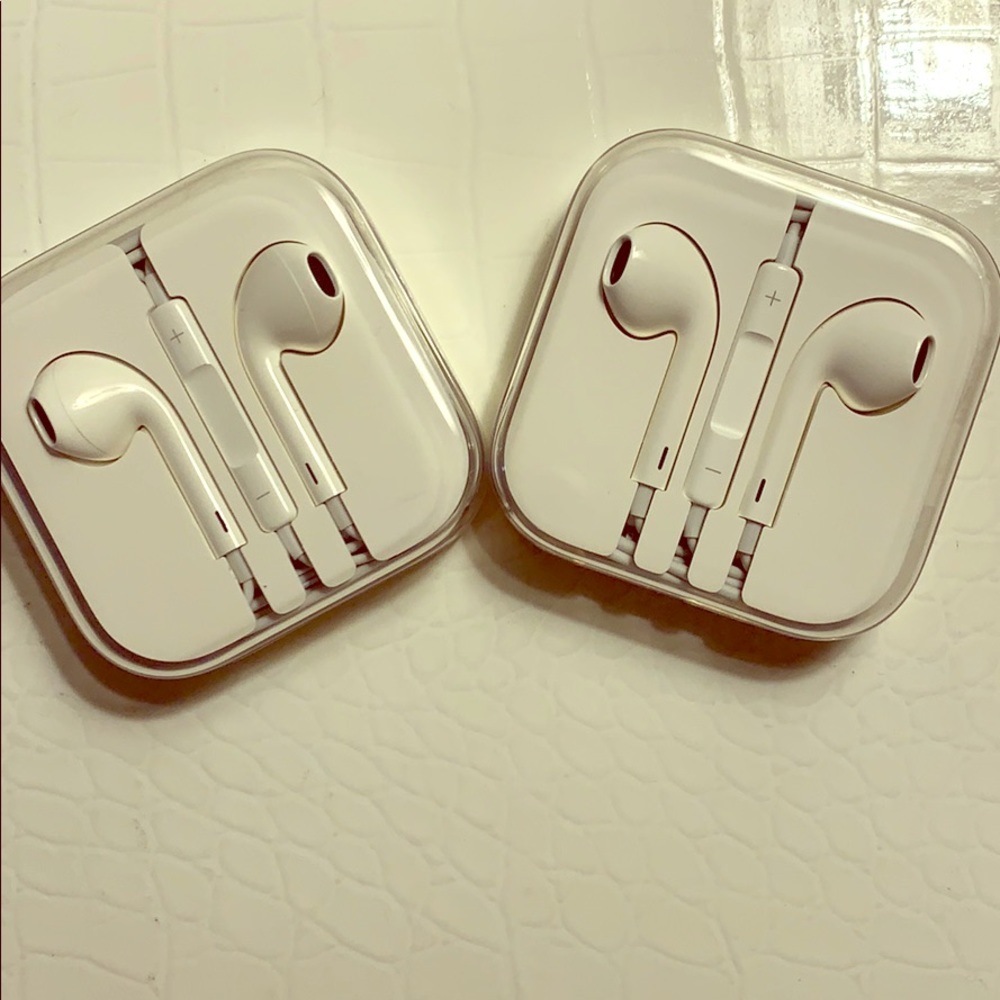 2 pair of wired Apple earbuds